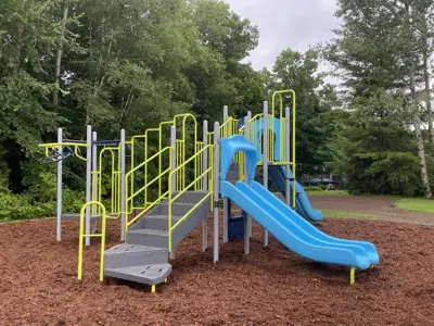 Laurel Park focused on a climbing structure with a slide