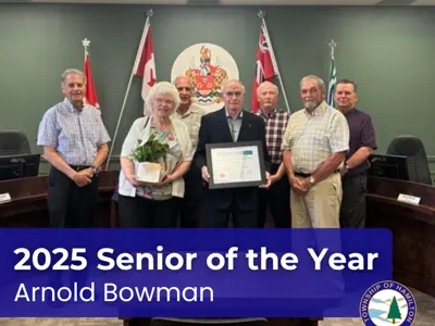Senior of the year winner Arnold Bowman posed with award alongside wife, June, and council members