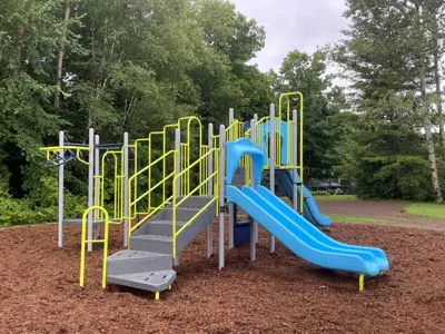 Laurel Park focused on a climbing structure with a slide