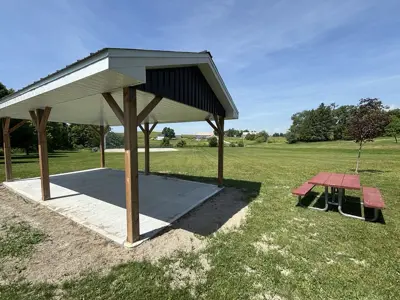 Cold Springs Park focused on a picnic shelter with picnic tables