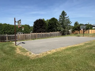 Old Camborne Schoolhouse Playground focused on a basketball court