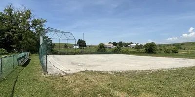Cold springs baseball diamond surrounded by greenery and farmland