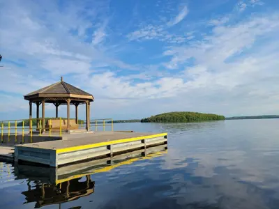 concrete pier with gazebo facing towards Rice Lake